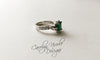 Emerald and Sapphire Skull Engagement Ring by Carolyn Nicole Designs